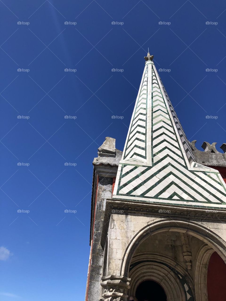 Tower in green and white and triangle stripes 