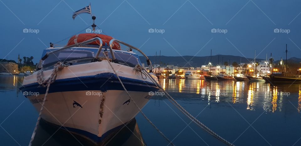 Sailors heart, after sunset view of the port in Kos, Greece.