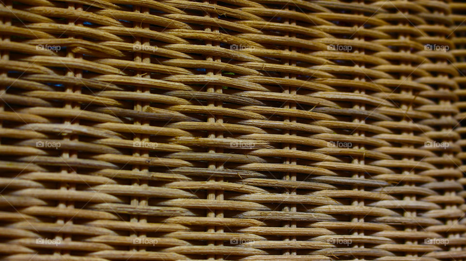 this is a wicker basket that is woven to store objects and foods that you want to protect