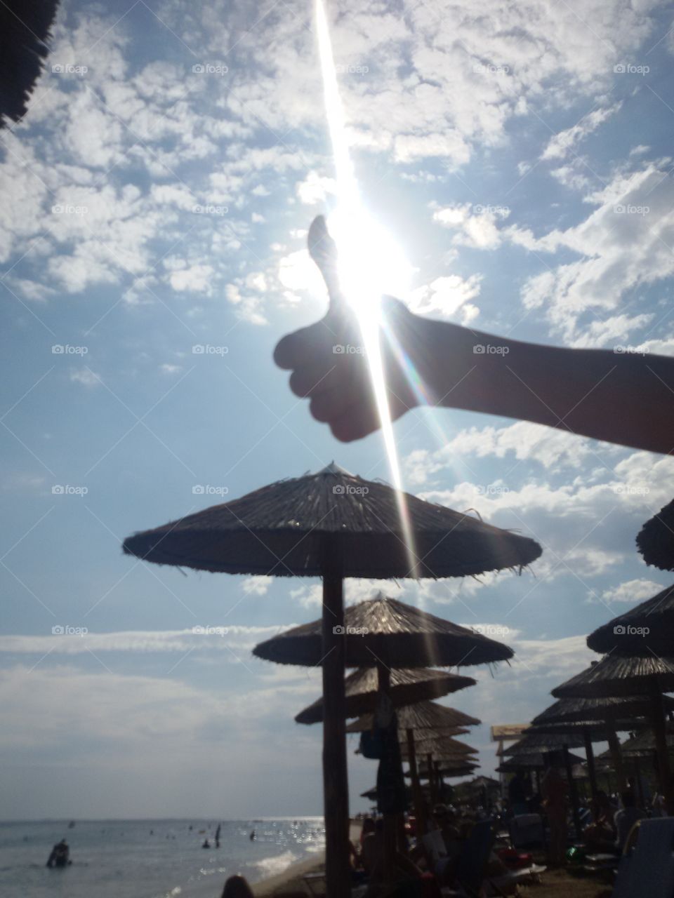 Thumbs up on the beach