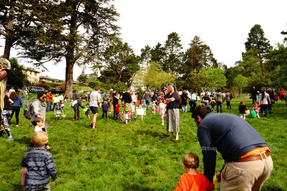 Happy Easter! Easter eggs hunt at the local park.  so crowded but so much fun.  The park filled of people, family and friends!