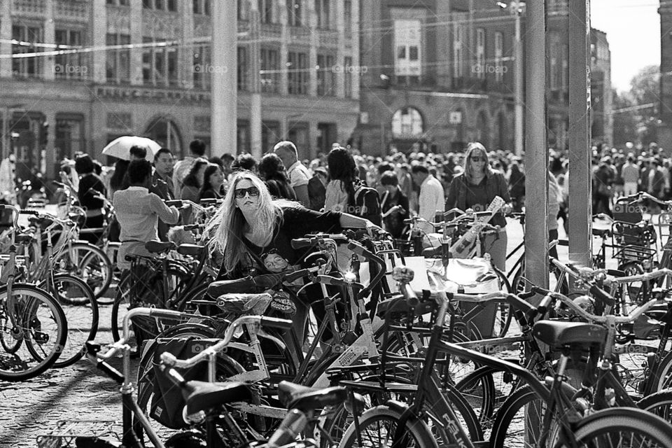 blond girl and bicycles. Amsterdam