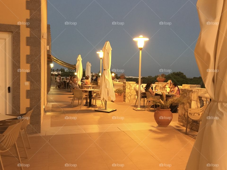 Terrace at night with social distance 