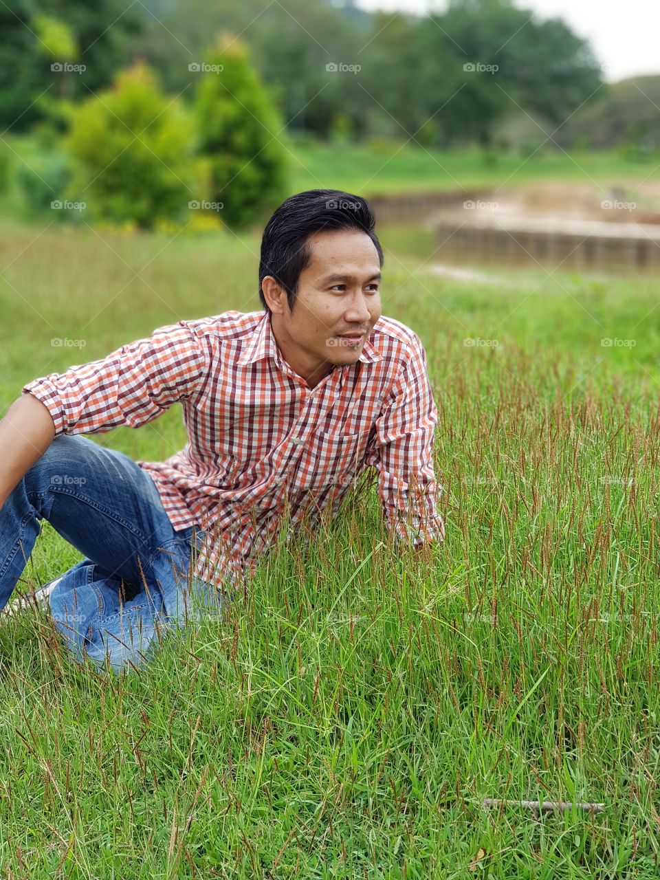 sitting on the grass