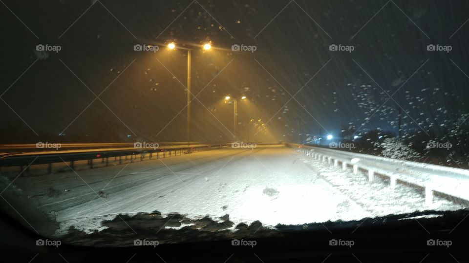 snow driving night