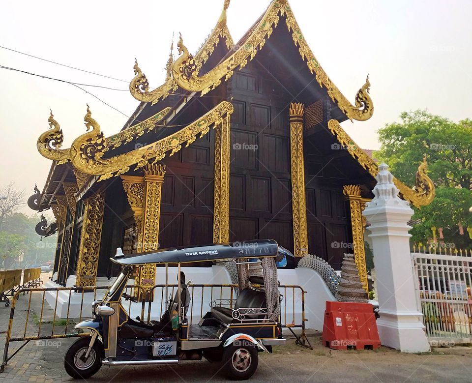 taxi. thai taxi and temple. tuk tuk. thailand.