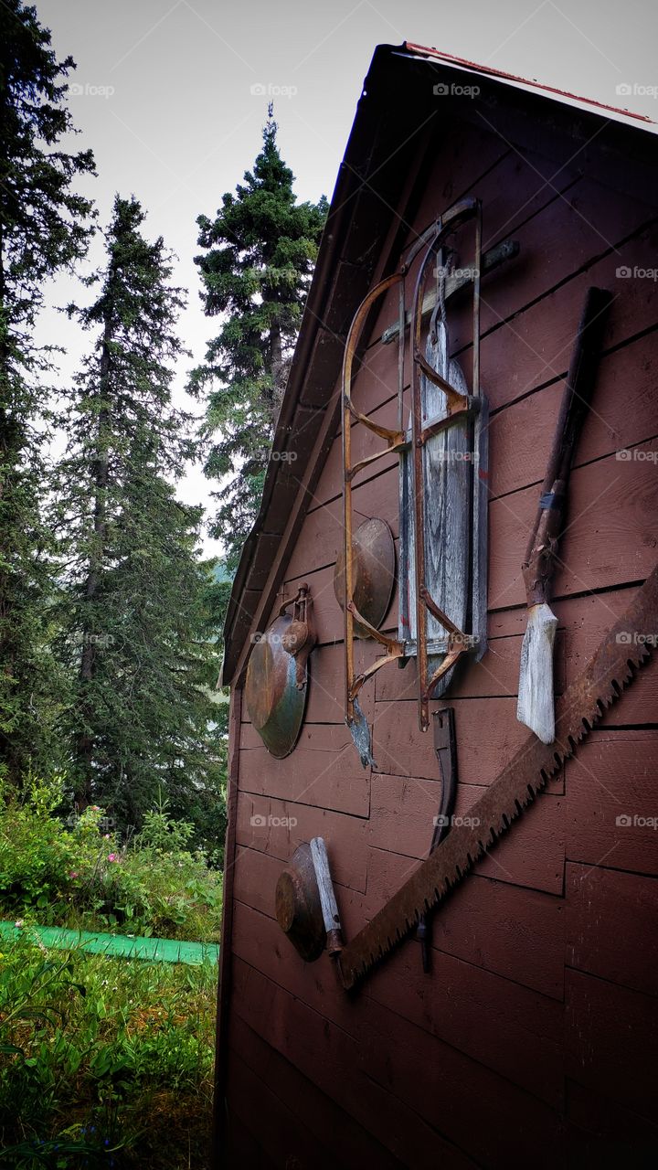 Tools from another era adorn the little cabin of the couple that made their home in this special place years ago.