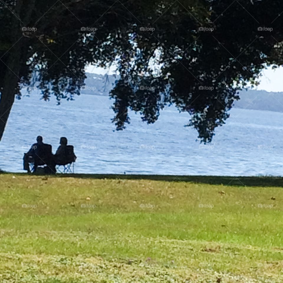 Couple overlooking water