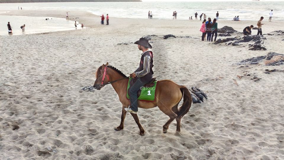 cowboy on the beach
