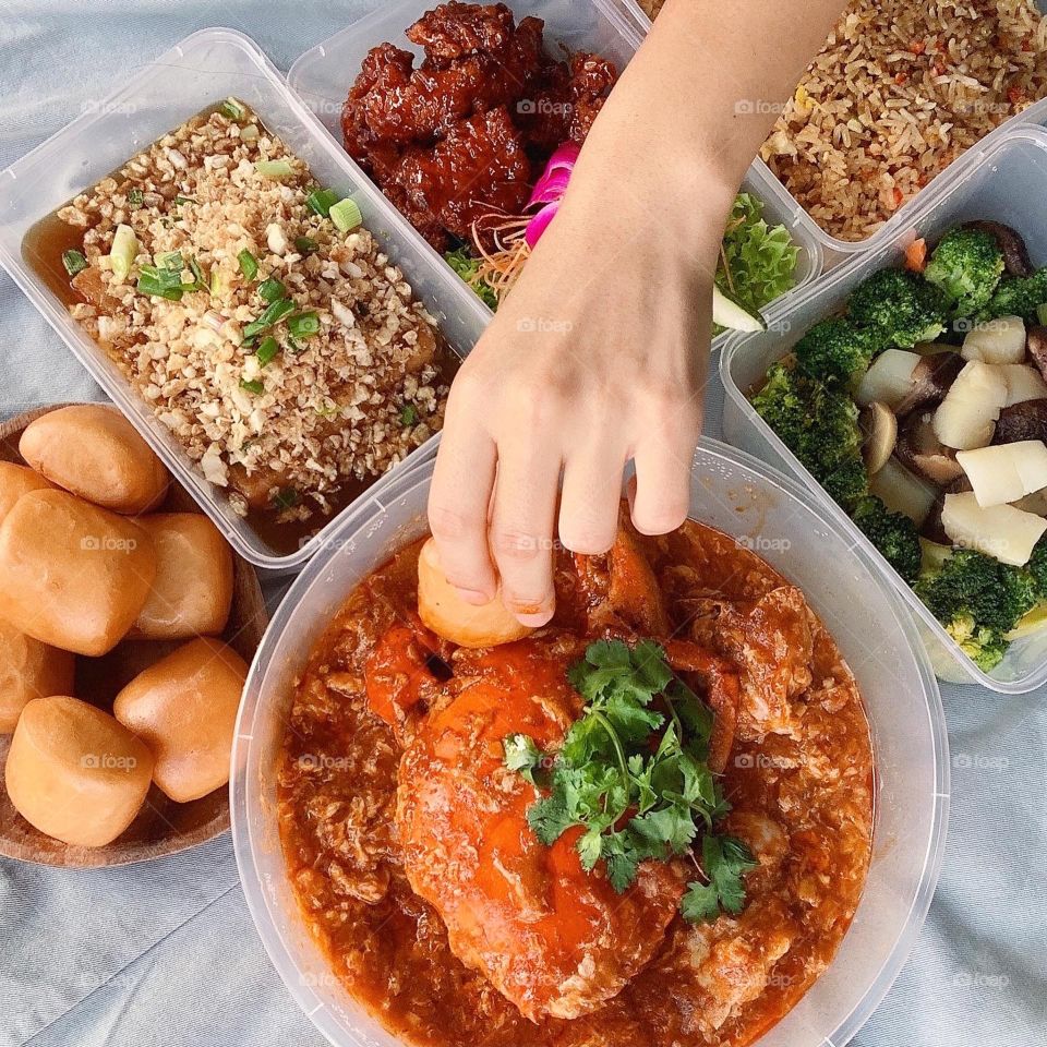 Asian local dishes in tze char style, Chilli crab, coffee pork ribs, caipo beancurd, broccoli with scallops and classic fried rice 