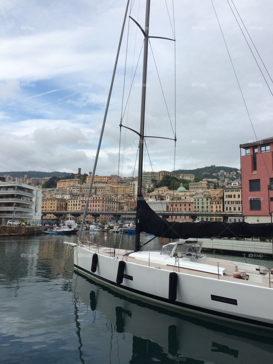 Sailboat in the port. A sailboat ready for an adventure in Genoa, Italy