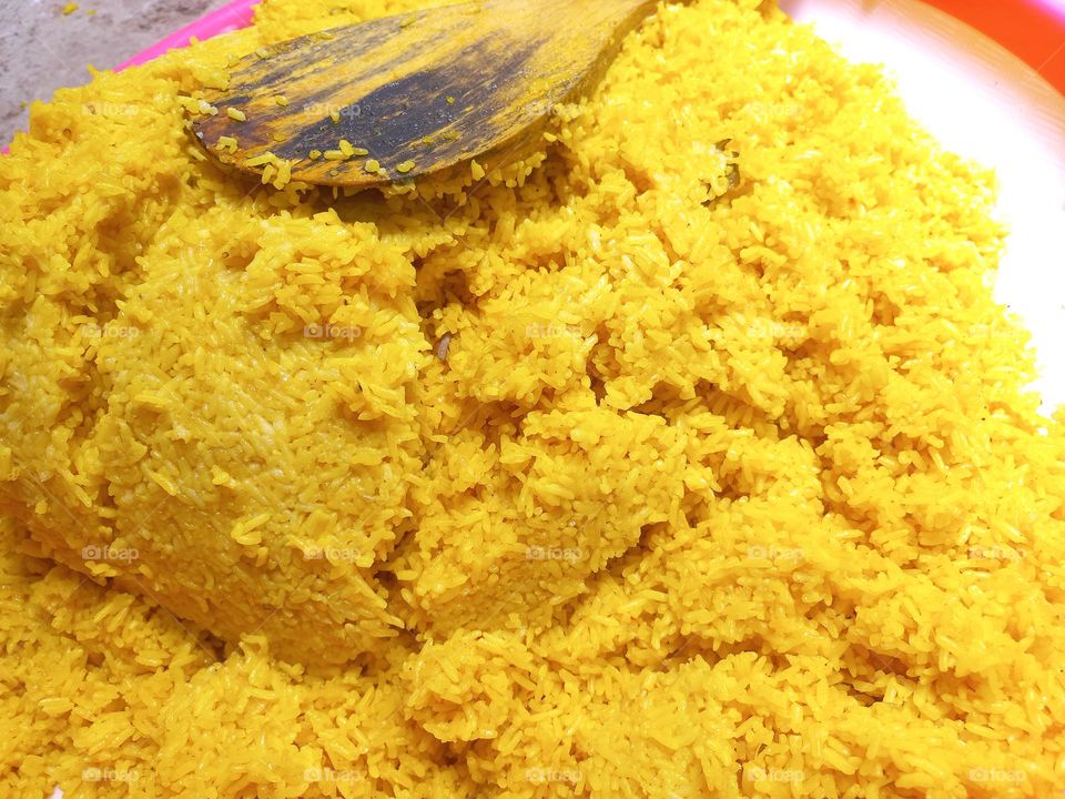 This dish is made from rice cooked together with turmeric and coconut milk and spices