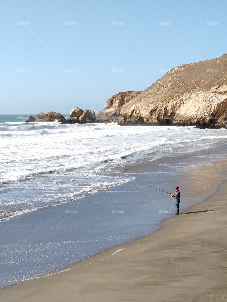 Fishing from shore. Pacificia, CA