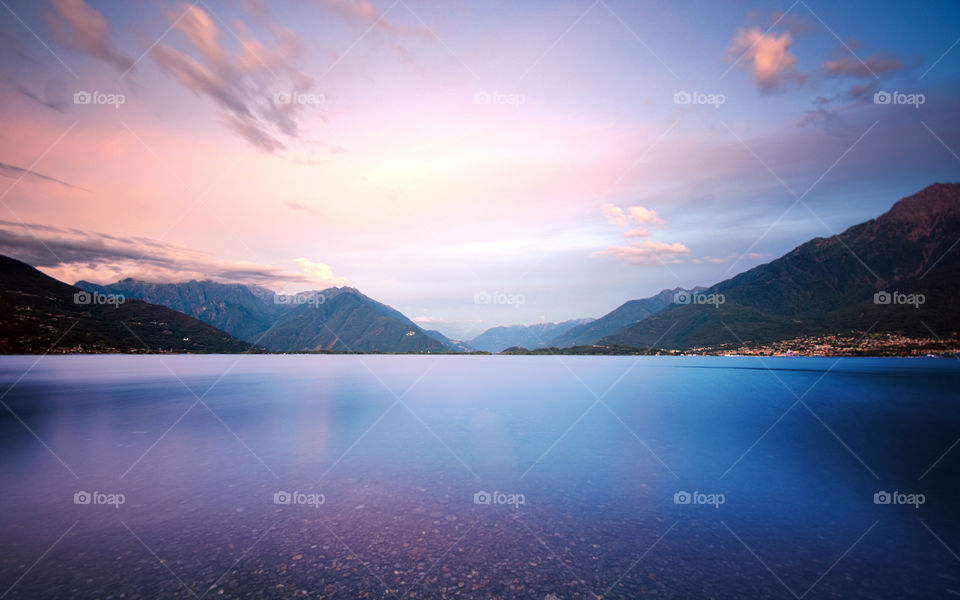 Dusk over lake. The rosy twilight of a summer day on Lake Como.