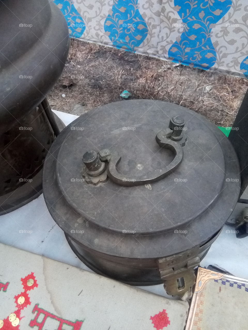 old and antique utensils made of brass.