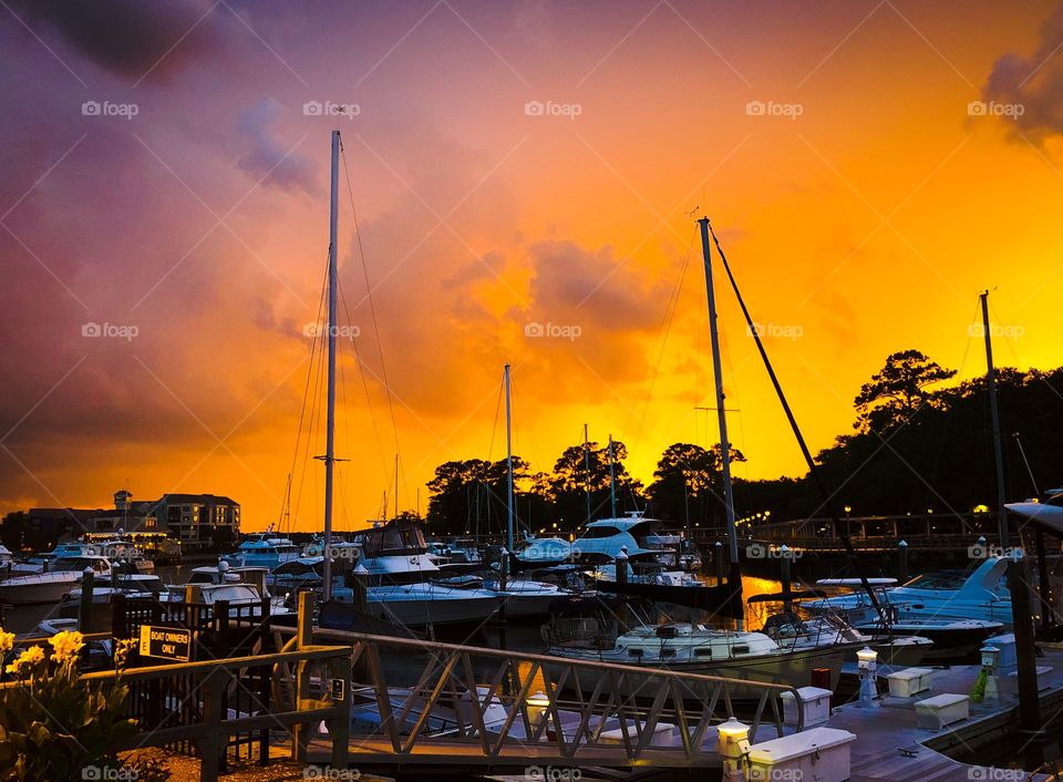 Colorful Sunset as a storm blows in over the marina