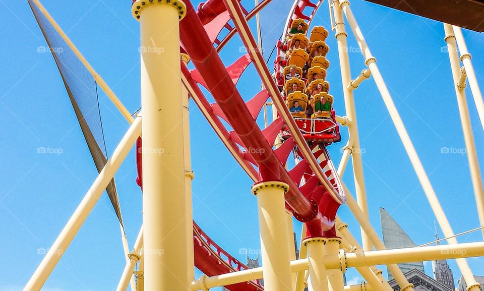 under the roller coaster