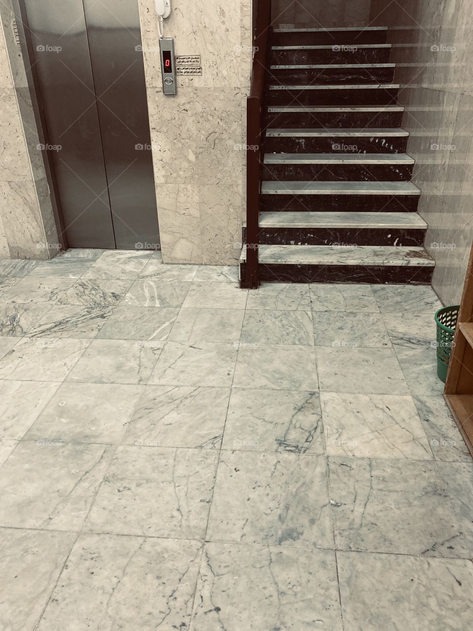 Remember of God at the elevator door to remind visitors to the mosque to remember and earn reward 