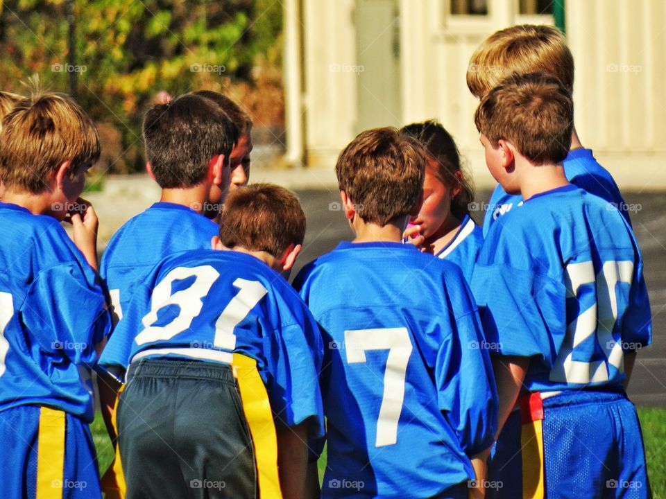 Young Kids Playing Team Sports