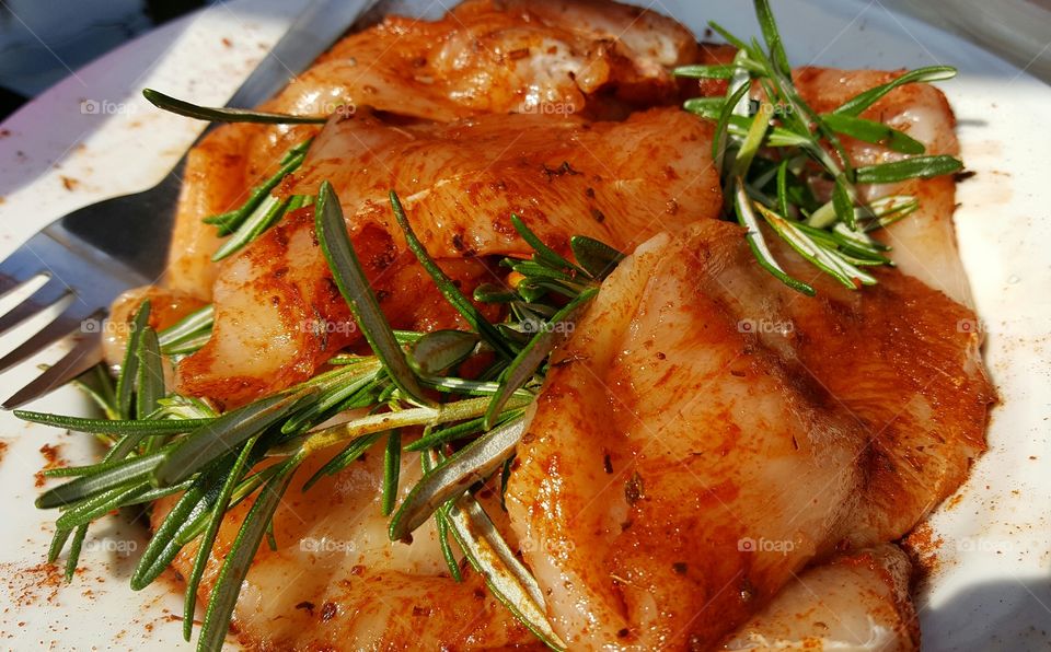 Fresh chicken breast with rosemary