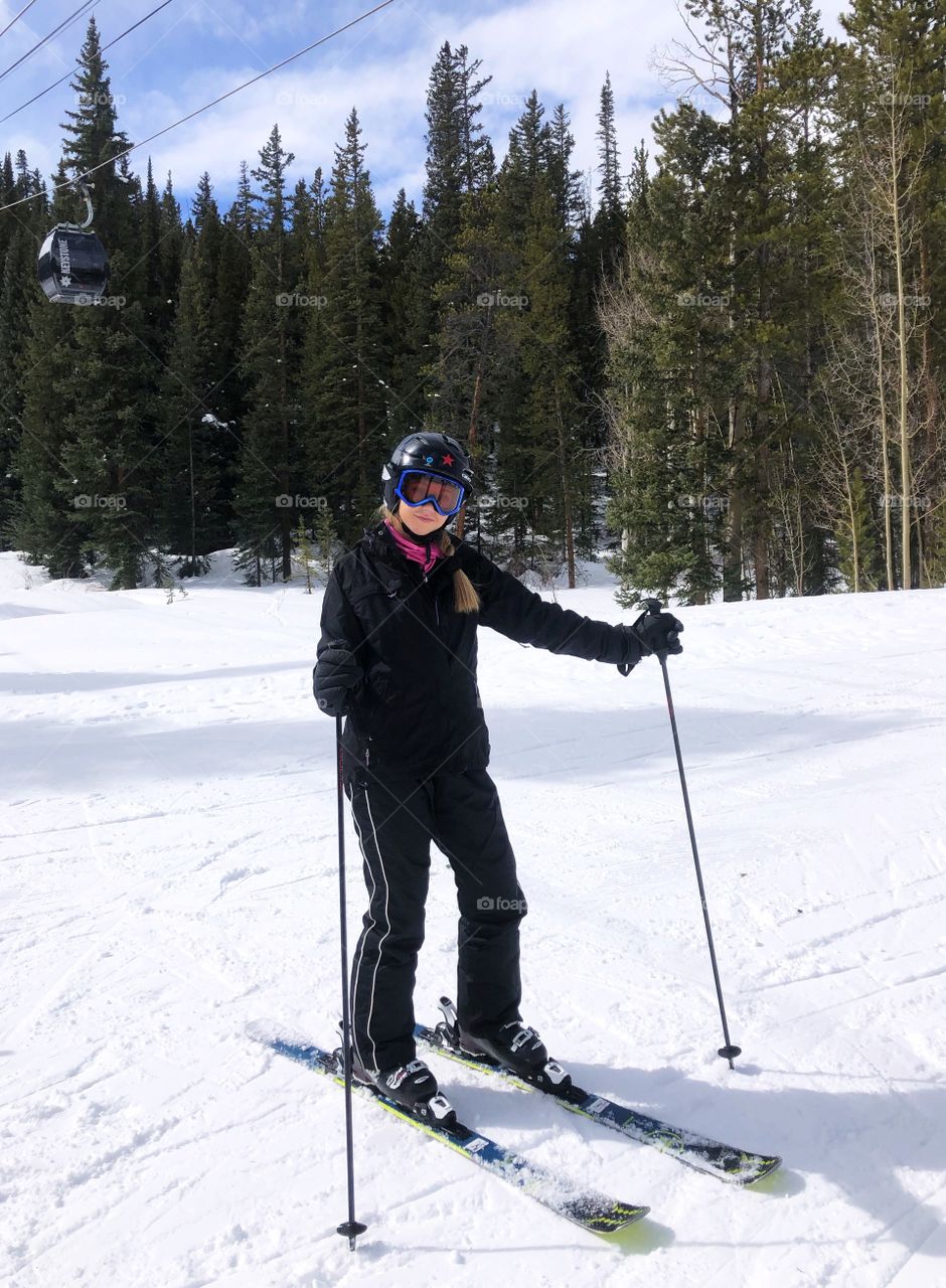 Young woman on the ski slopes in Colorado
