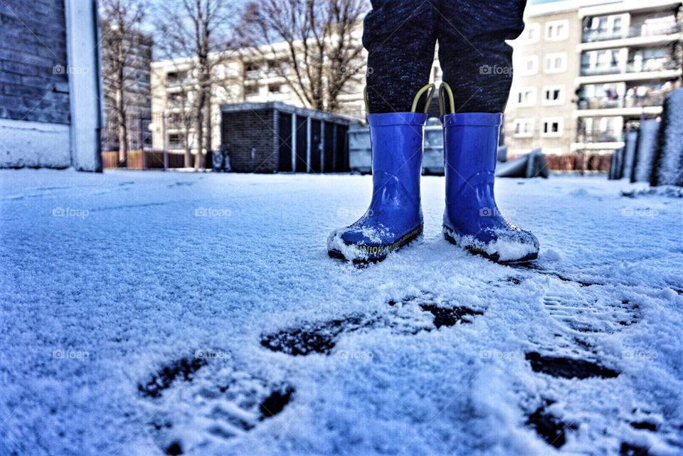 Blue wellingtons in the snow