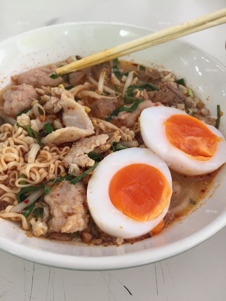 Tomyan noodle from Thailand with egg boiled and pork tested soo spicy