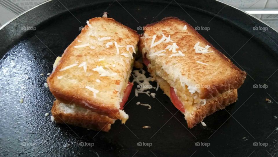 pic of delicious pieces of sandwich whit cheese.