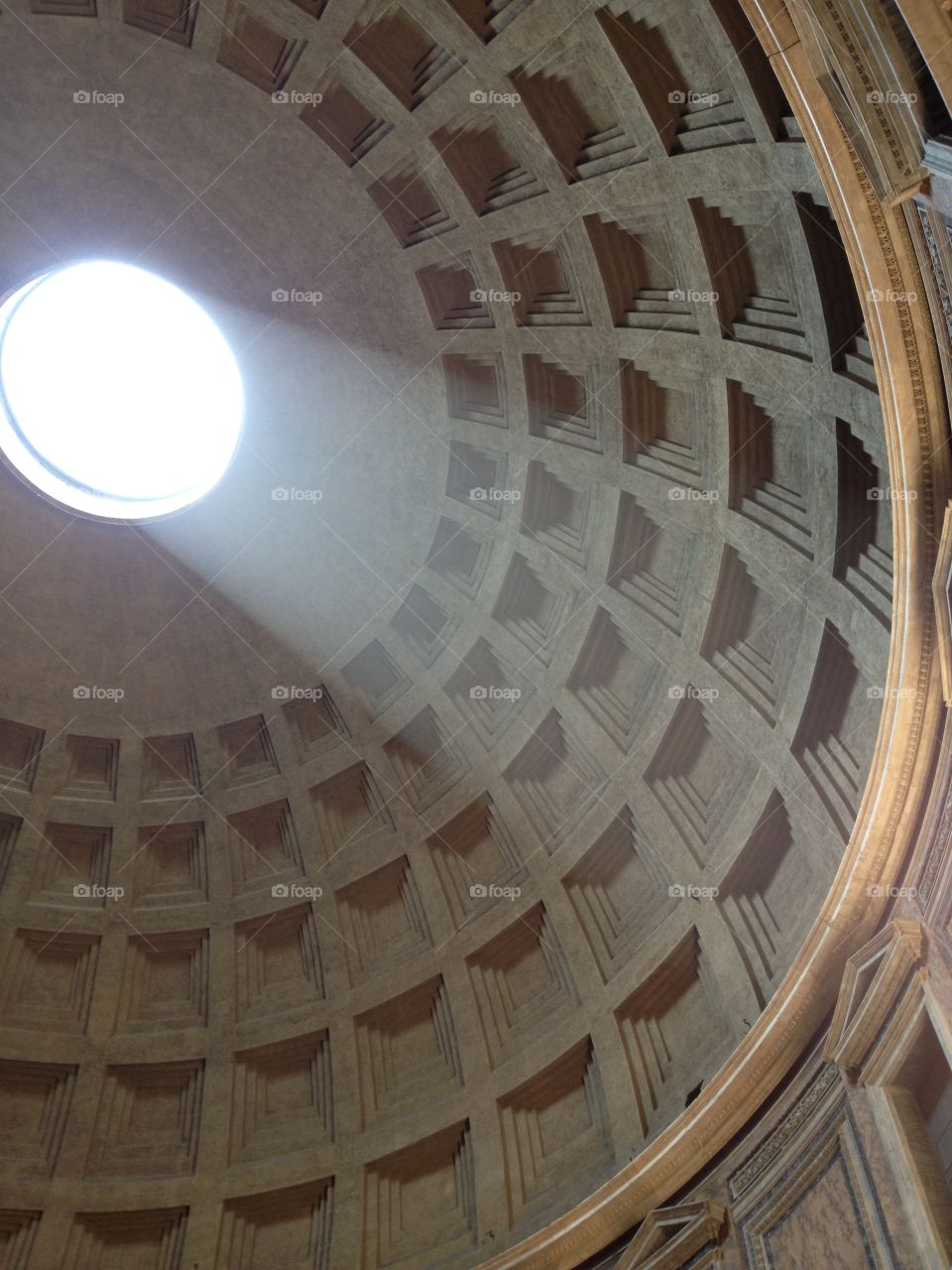 The ceiling of the pantheon in Rome, italy