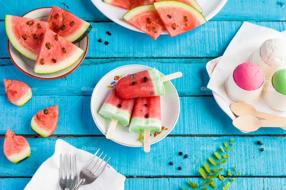 Watermelon popsicles and icecream, ready to eat.