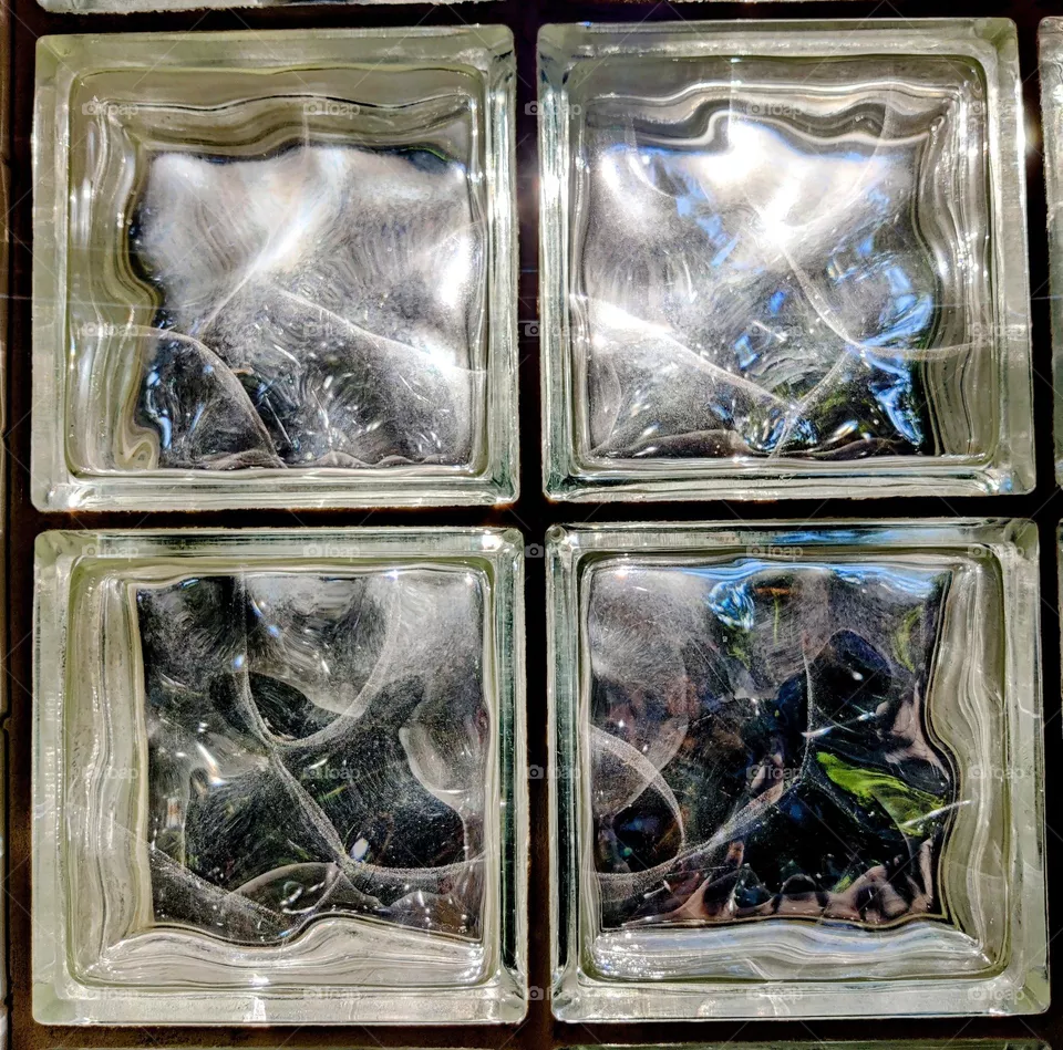 Morning sun through glass tiles