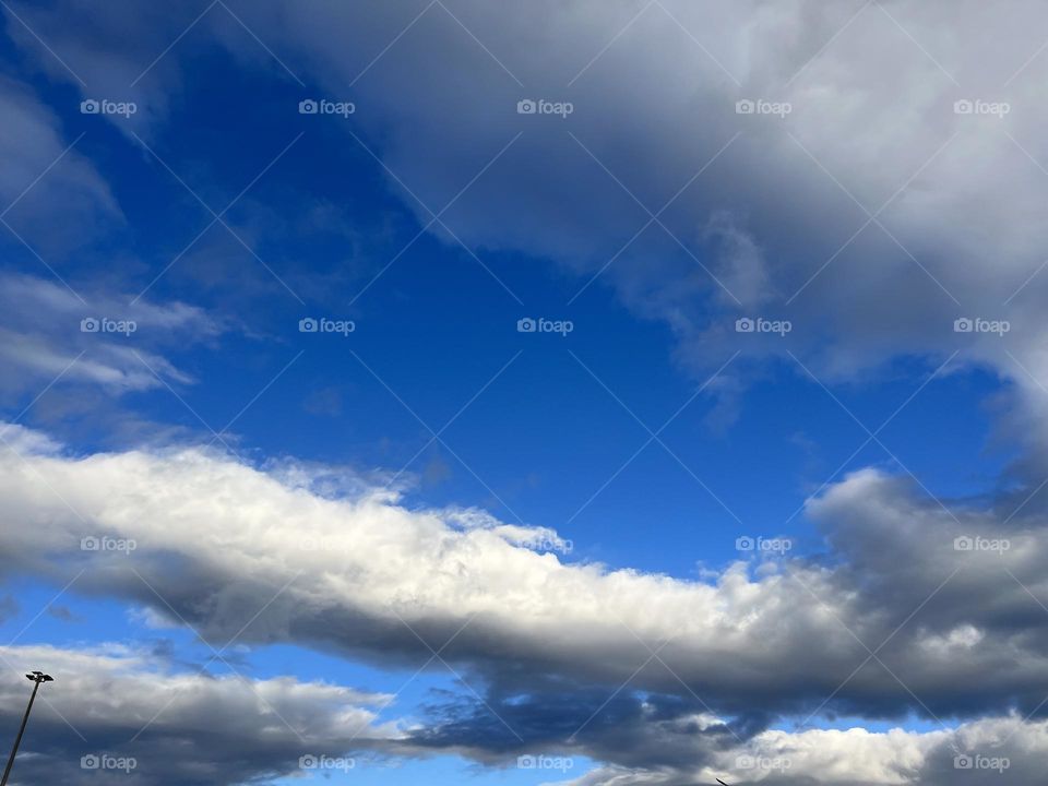 Bright blue sky with different kinds of clouds