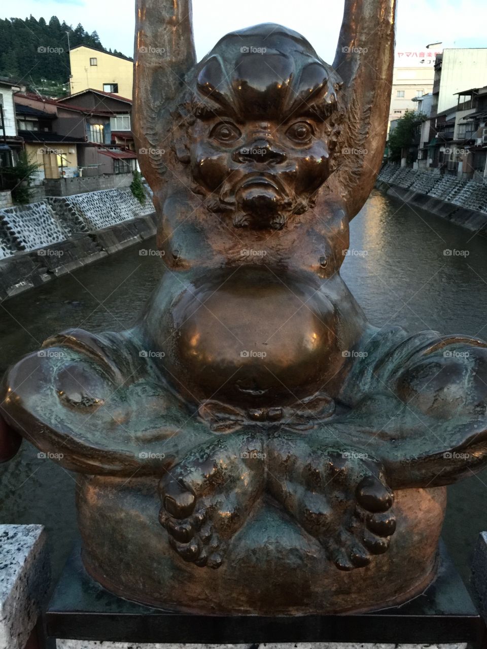 Statue on bridge in Takayama Japan