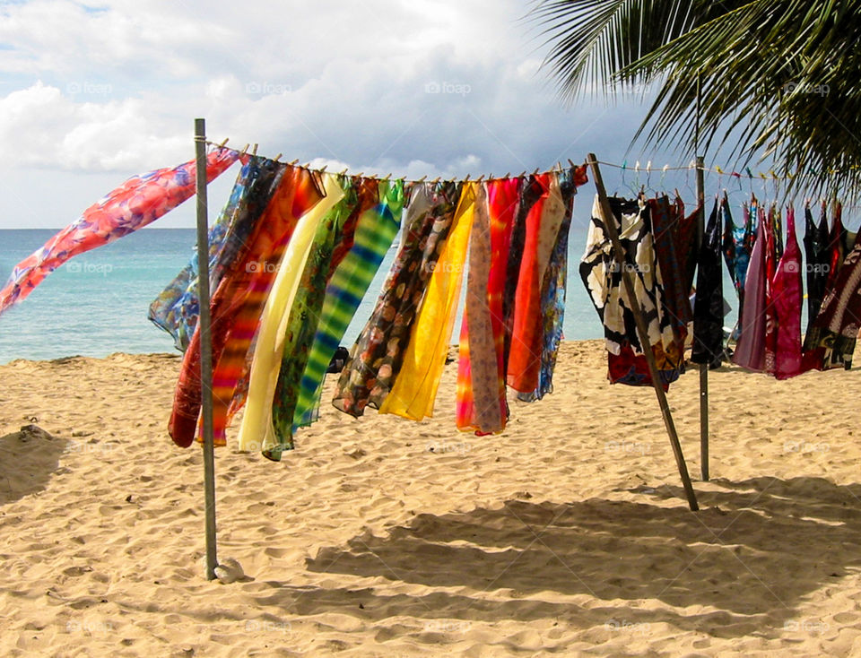 Clothes in the wind. Clothes for sale on the beach. 