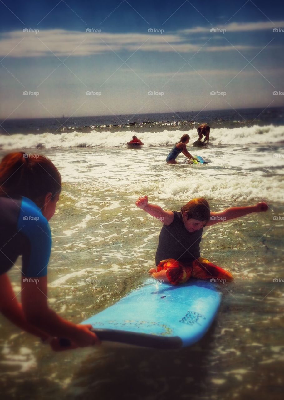 Child on surfboard