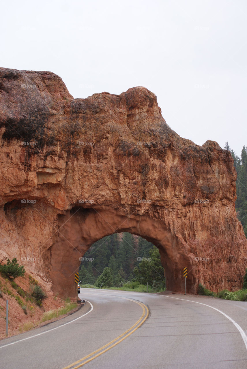 Stone tunnel on road