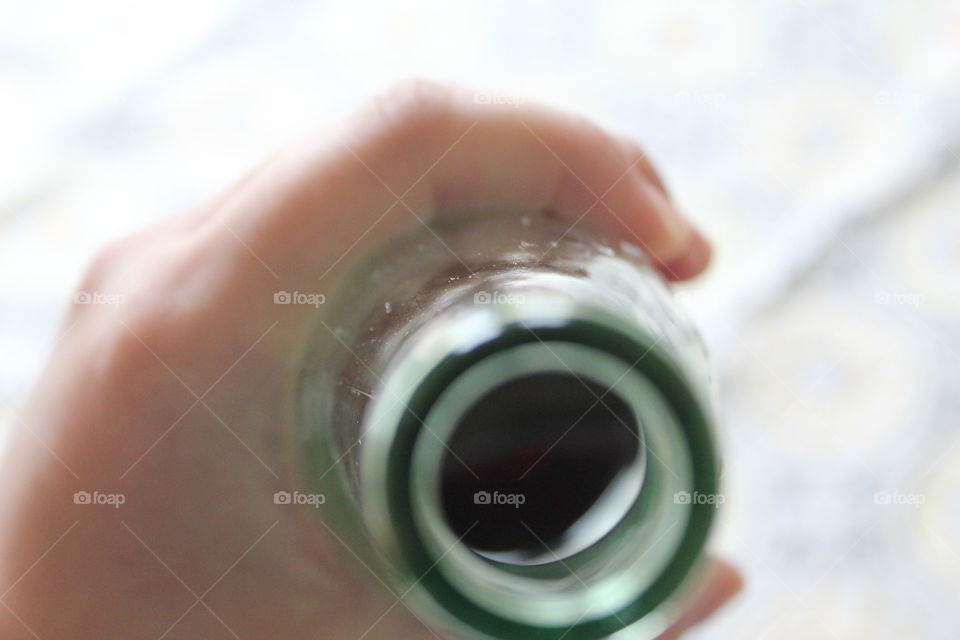 bottle opening in hand