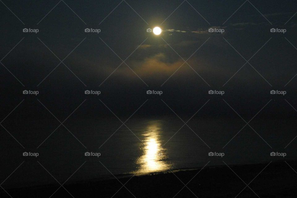 Moon reflects on the ocean