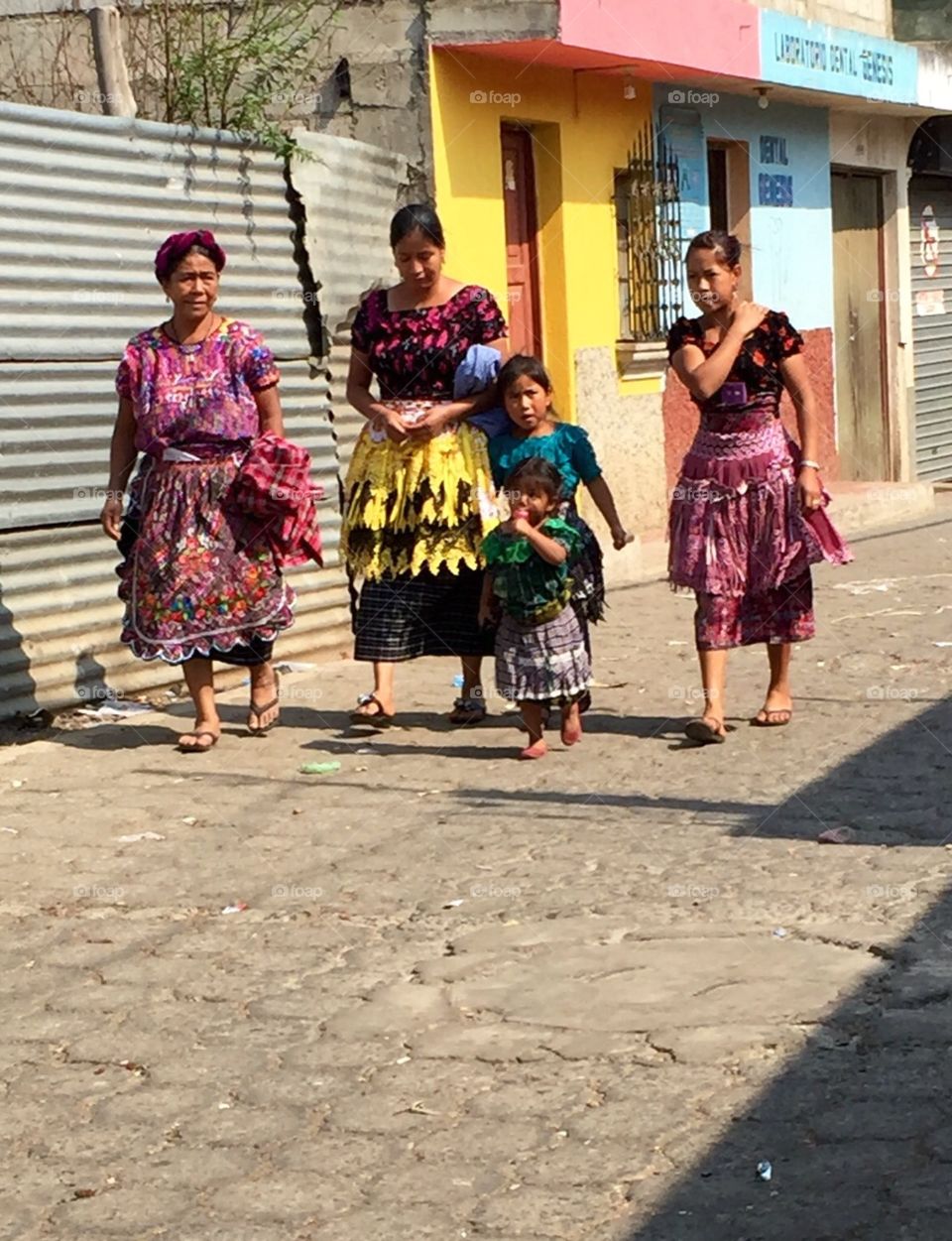 Colorful People Of Guatemala. Ladies dressed in traditional Mayan colors