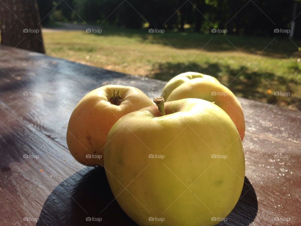 Apples on a wooden table 