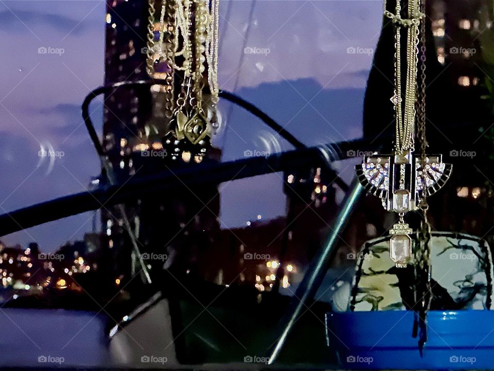 As the hours progress the sky turns increasingly more purple at “Newtown Creek” in LIC, Queens seen from “Salvation”, our “28 ft 1969 Luhrs” cabin cruiser. A glittering “Greenpoint”, Bklyn high rise is across the way. 2024. Hypnotic Productions