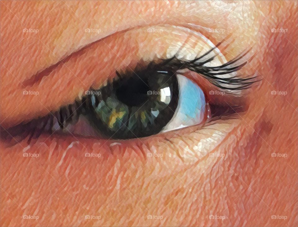 Closeup of a female child’s hazel eye