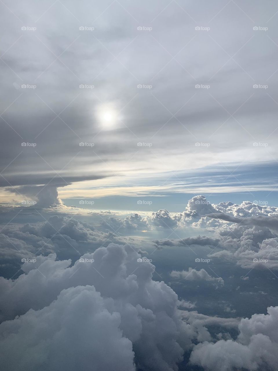 Awe inspiring shot from inside an airplane heading to my vacation. 