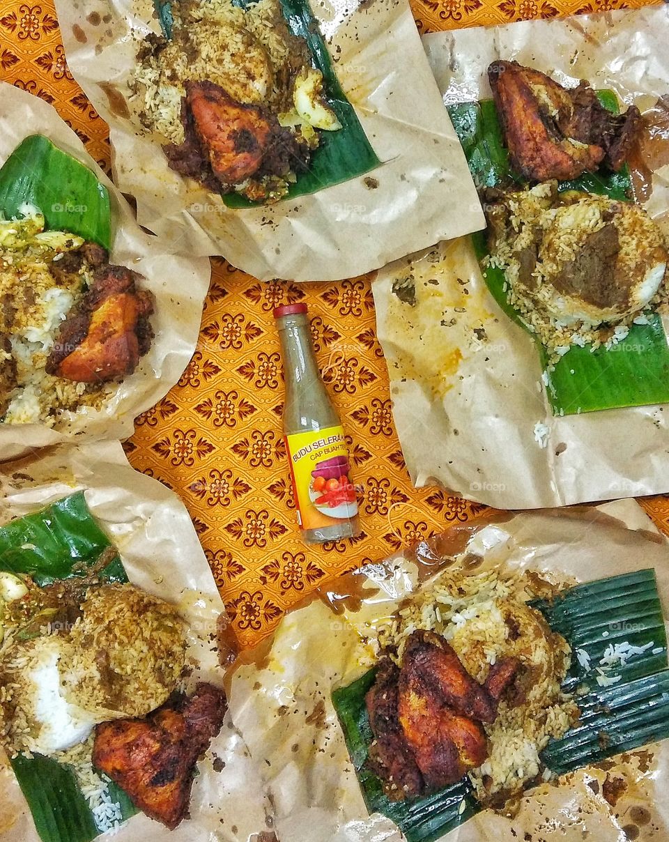 Nasi Kukus with spicy chicken .