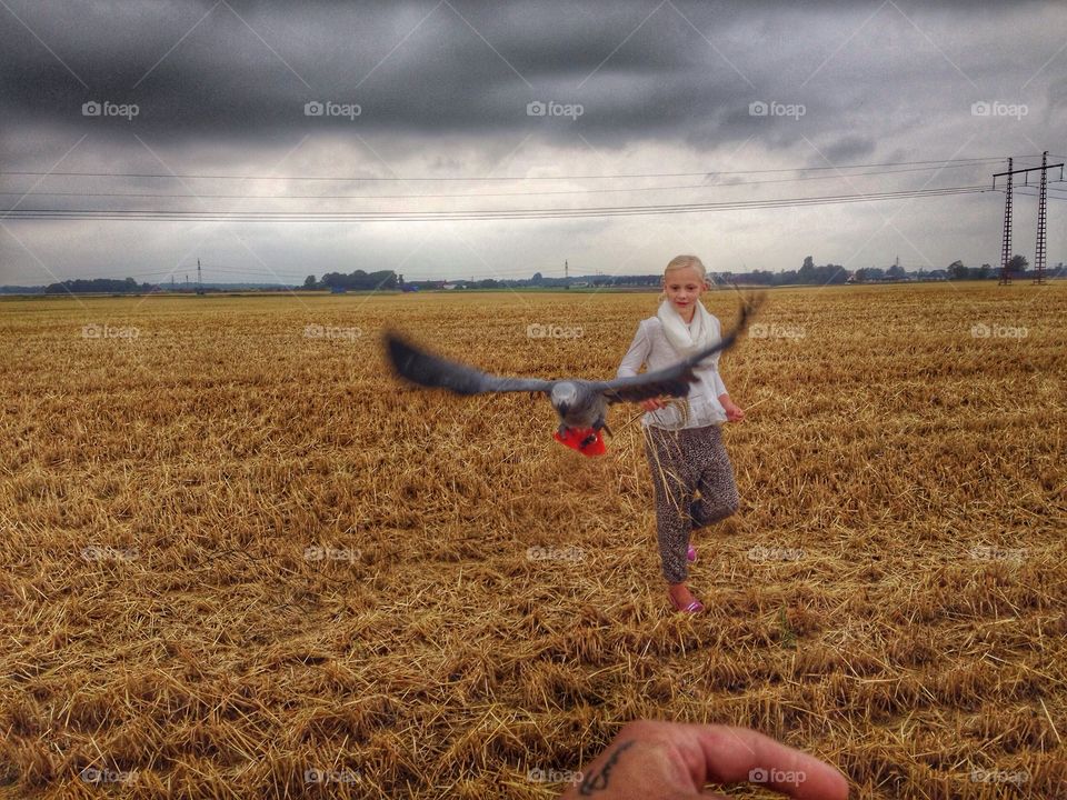 Parrot. Having fun at the field