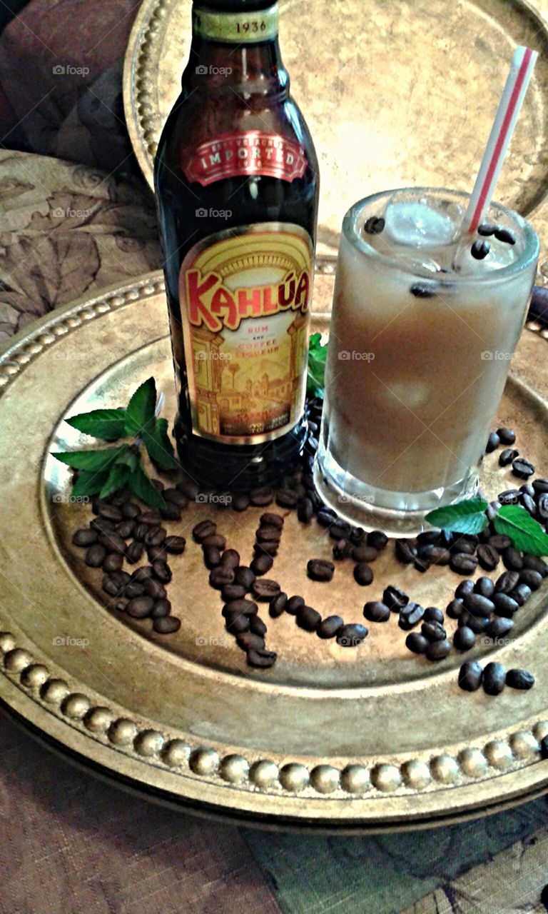 Kahlua and coffee with cream iced. Kahlua creates the best remembered iced coffee with cream.