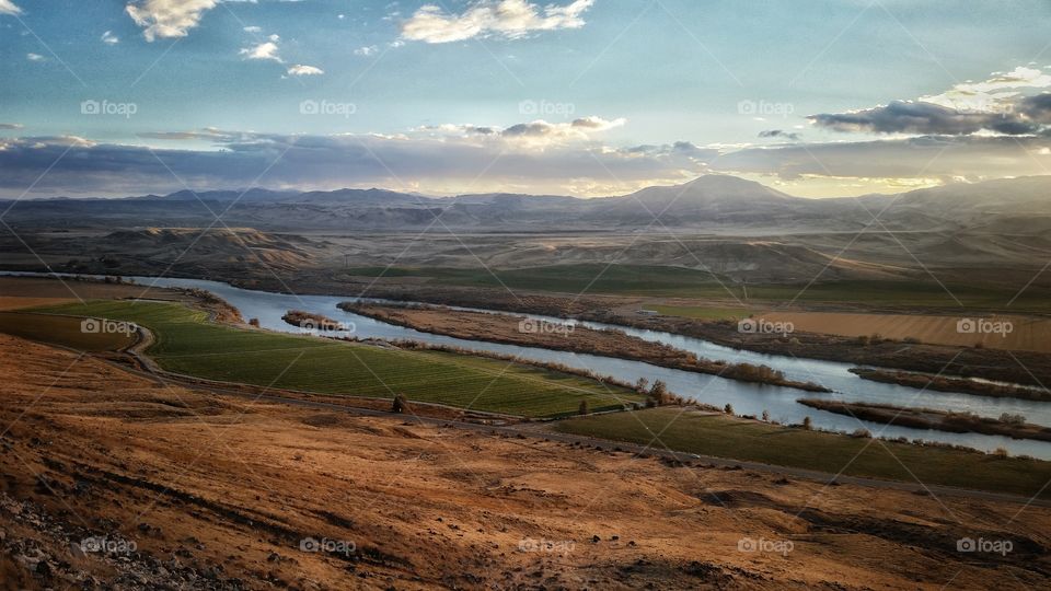 The river, mountains, and clouds.  peace evening.