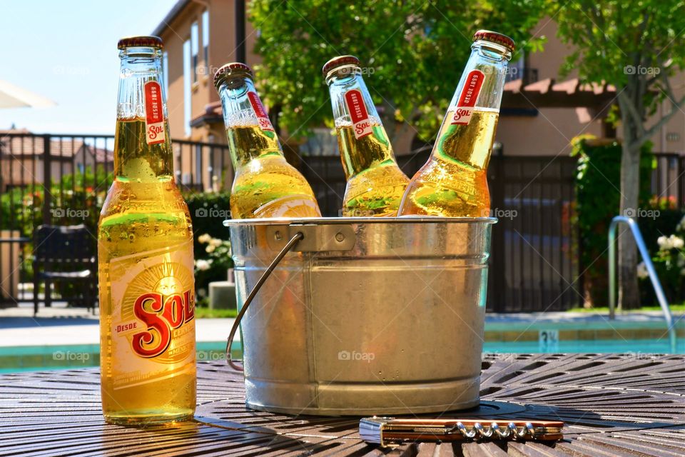 Pool party with cold beer