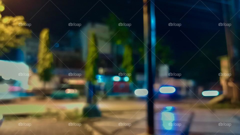 Defocused abstract background of city
street at night with street lamp lighting.
Blurred cityscape,Lighting
night at tourist attraction colorful.