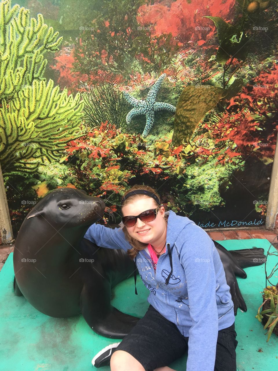 Awe...posing with a silly seal statue on Catalina Island, CA
